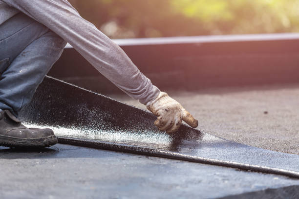 Professional Basement Waterproofing technician working in Houston, MO